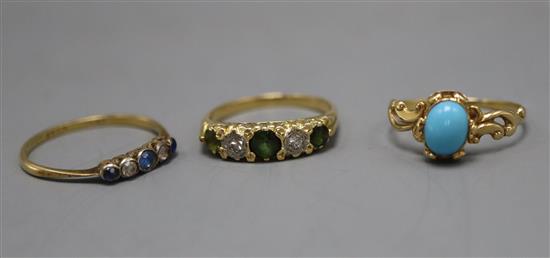 Three assorted gem set rings including one stamped 18ct.